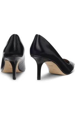 Heeled pumps in leather with debossed logo