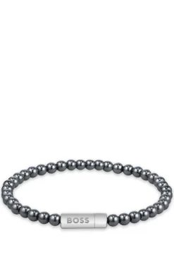 Hematite-bead cuff with logo closure