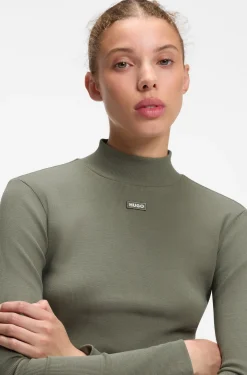 High-neck stretch-cotton top with logo badge