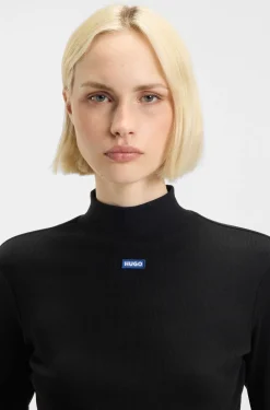 High-neck stretch-cotton top with logo badge