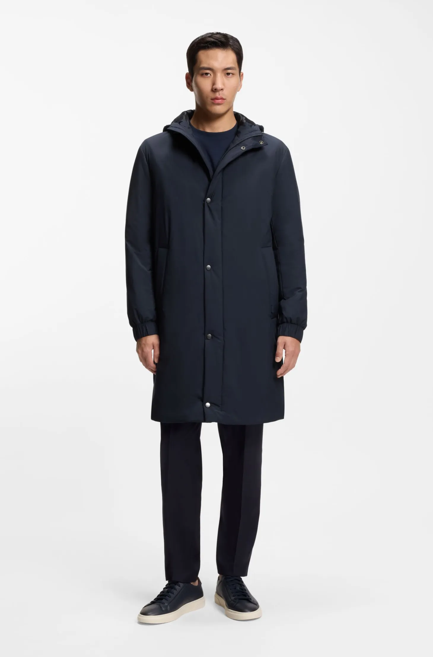 Hooded coat in water-repellent fabric with padding