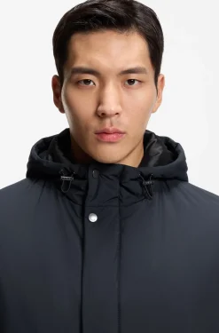 Hooded coat in water-repellent fabric with padding