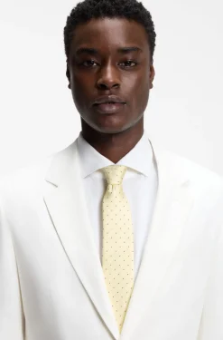 Italian-made tie in silk with jacquard-woven dots