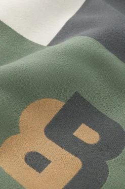Jacquard throw with whipstitching