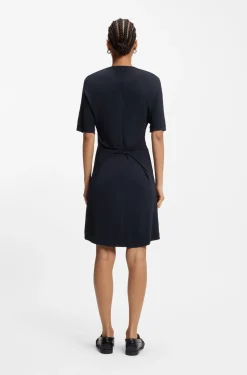 Jersey dress with rear drape detail
