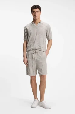 Johnny-collar knit polo with graphic pattern