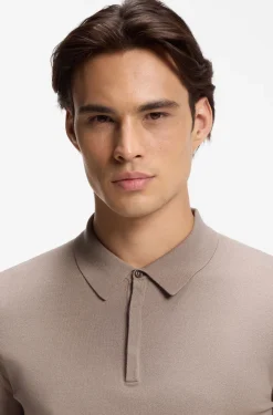 Knit polo with covered placket