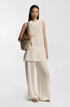 Knitted cotton top with micro-lace structure