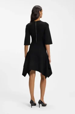 Knitted dress with shaped hemline