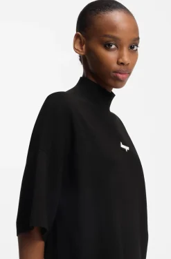 Knitted dress with silicone logo badge