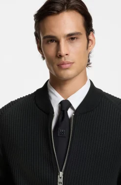 Knitted jacket with contrast sleeves