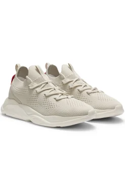 Knitted trainers with logo-embossed EVA sole