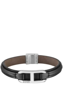 Layered leather cuff with branded silver-tone link