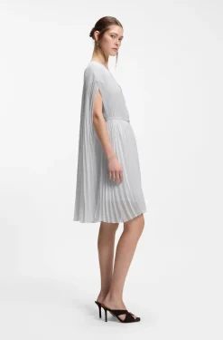 Layered plissé dress with cape