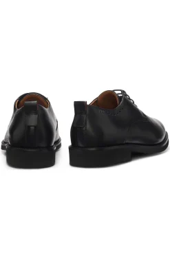 Leather Derby shoes with brogue details