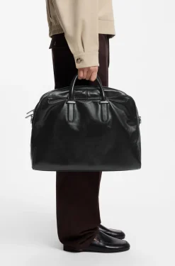 Leather holdall with embossed logo