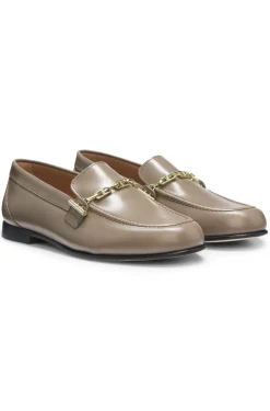 Leather loafers with chain trim and logo detail