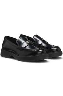 Leather loafers with penny trim and stacked logo