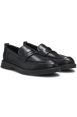 Leather loafers with perforated logos