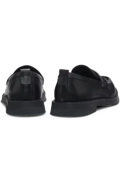 Leather loafers with perforated logos