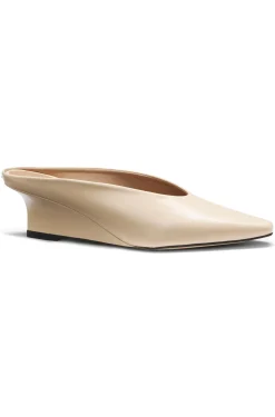 Leather mules with wedge heel
