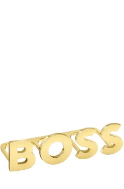 Light-golden-plated knuckle ring with logo letters