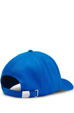 Logo cap in lustrous twill with country-flag badge