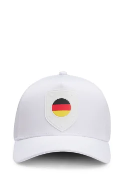 Logo cap in lustrous twill with country-flag badge