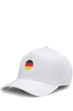 Logo cap in lustrous twill with country-flag badge