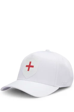 Logo cap in lustrous twill with country-flag badge
