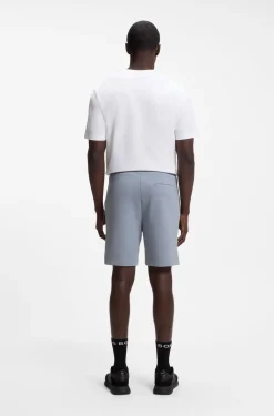 Logo-embroidered shorts in cotton-blend piqué jersey