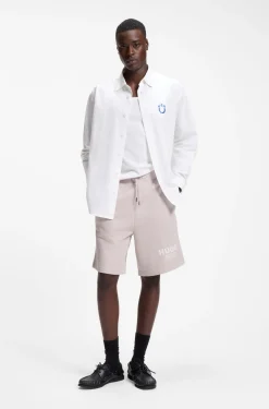 Loose-fit shorts in cotton terry with logo print