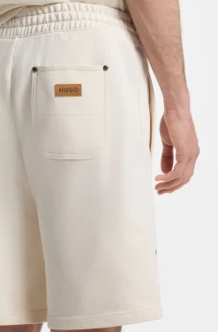 Loose-fit shorts in cotton with utility pockets