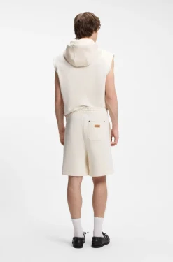 Loose-fit shorts in cotton with utility pockets