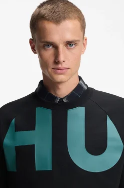 Loose-fit T-shirt in cotton jersey with wraparound logo