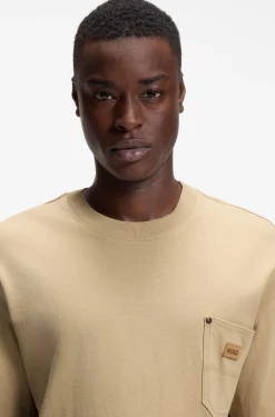 Loose-fit T-shirt in cotton with suede logo badge