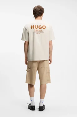 Loose-fit T-shirt in cotton with rear logo artwork