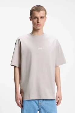 Loose-fit T-shirt in cotton with rear logo artwork
