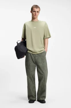 Loose-fit T-shirt in cotton with rear logo artwork