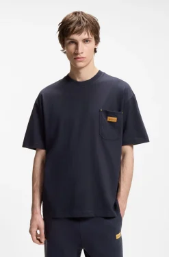 Loose-fit T-shirt in cotton with suede logo badge