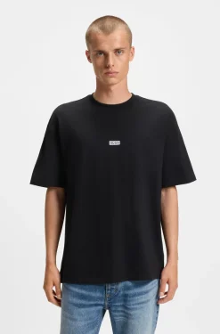 Loose-fit T-shirt in cotton with rear logo artwork