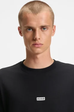 Loose-fit T-shirt in cotton with rear logo artwork