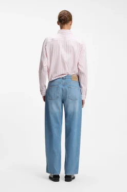 Loose-fit wide-leg jeans with charm accents