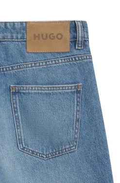 Loose-fit wide-leg jeans with charm accents