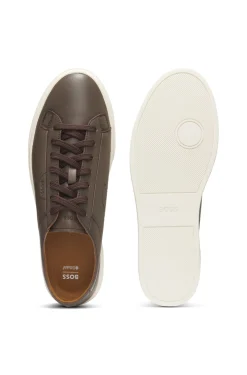 Low-top trainers in leather with embossed logo