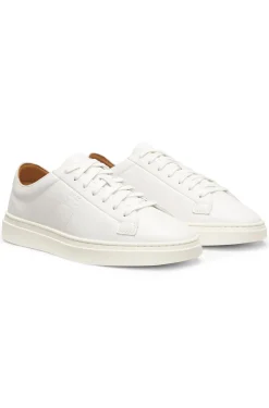 Low-top trainers in leather with embossed logo