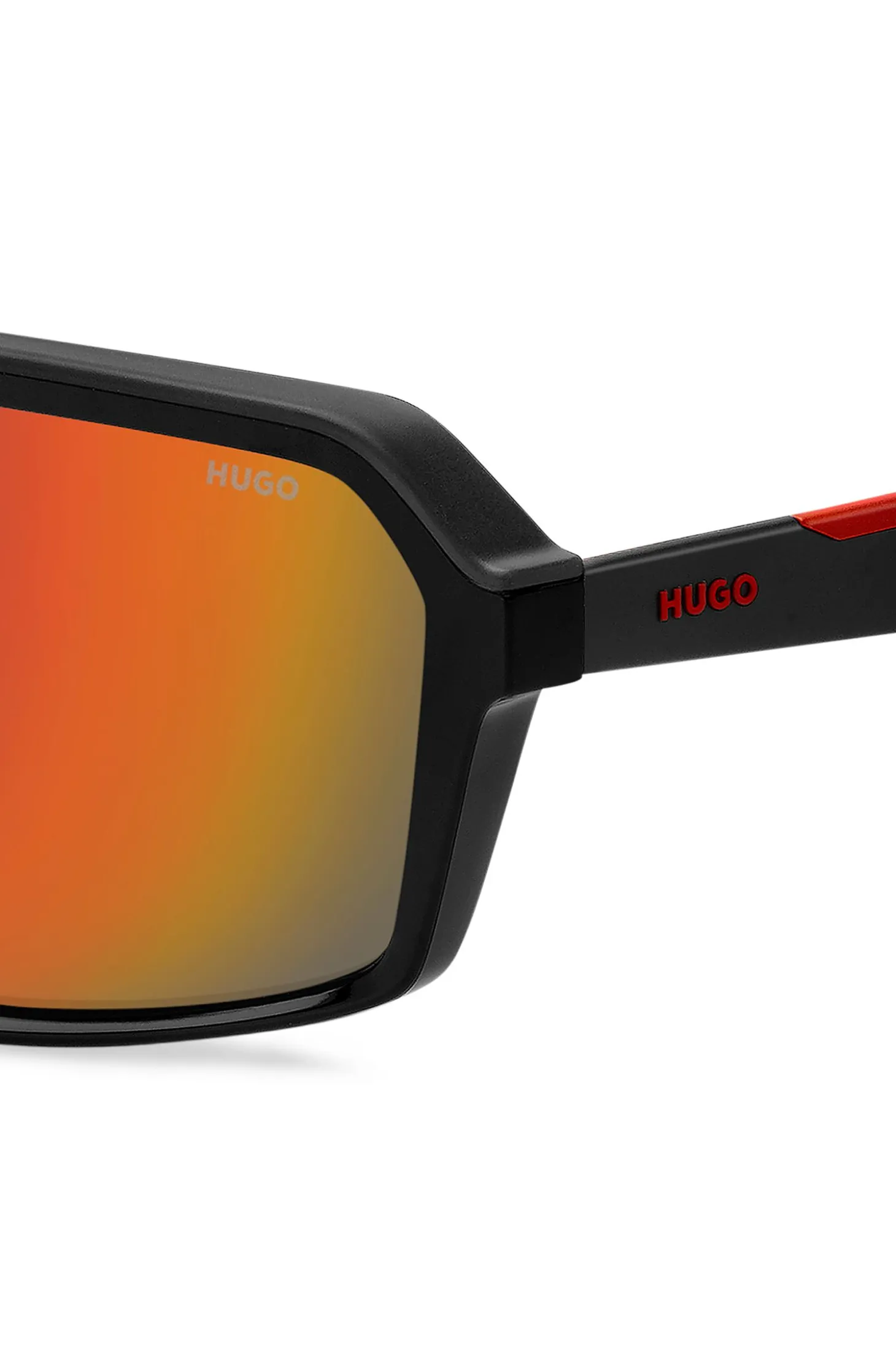 Mask-style sunglasses with red shaded lenses