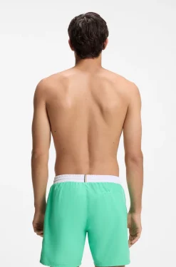 Medium-length swim shorts with contrast details