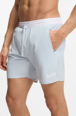 Medium-length swim shorts with contrast details