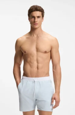 Medium-length swim shorts with contrast details